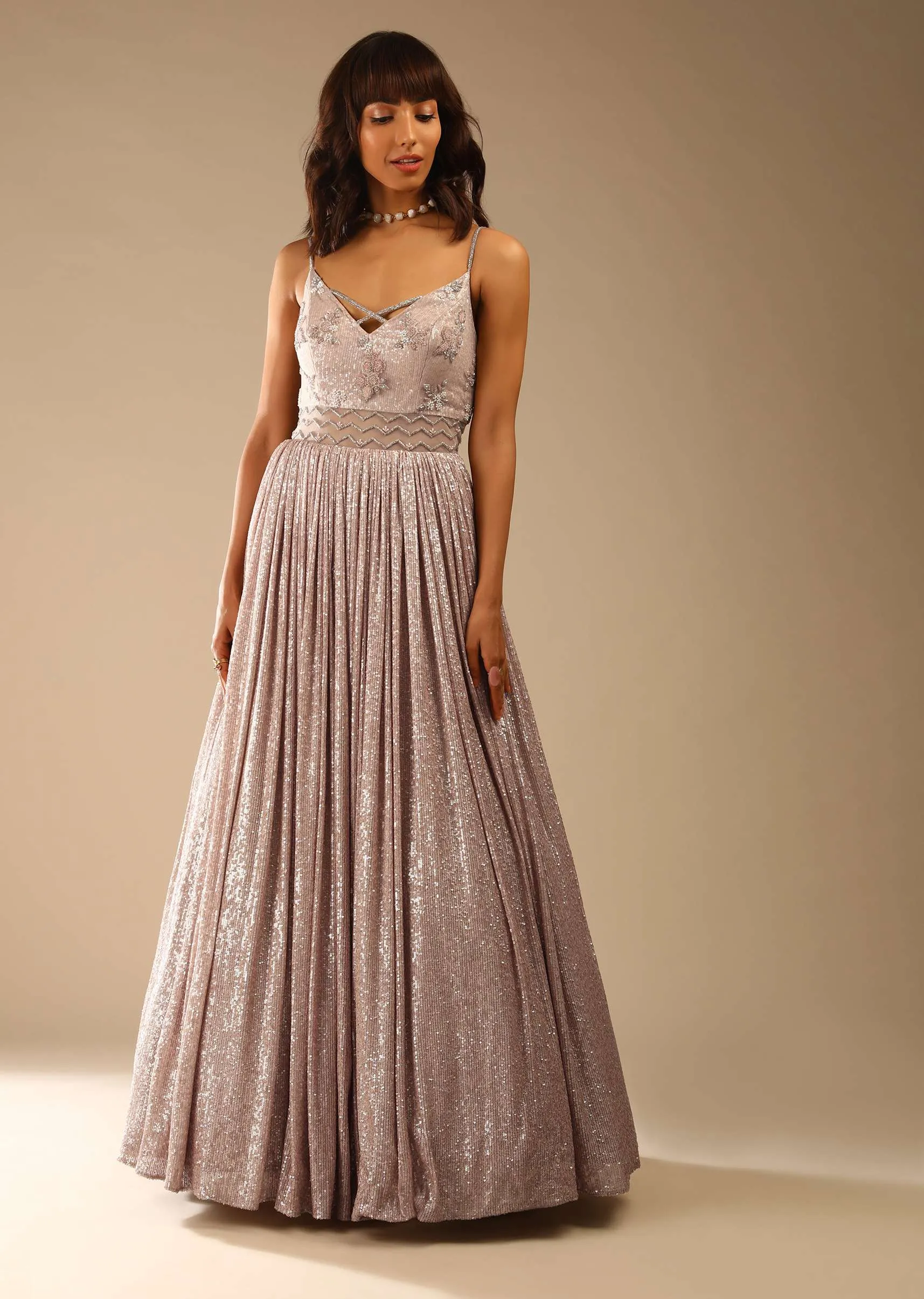 Champagne Gown Embellished In Sequins With Cut Dana Embellished Sheer Net On The Waist And Criss Cross Straps On The Neckline Online - Kalki Fashion