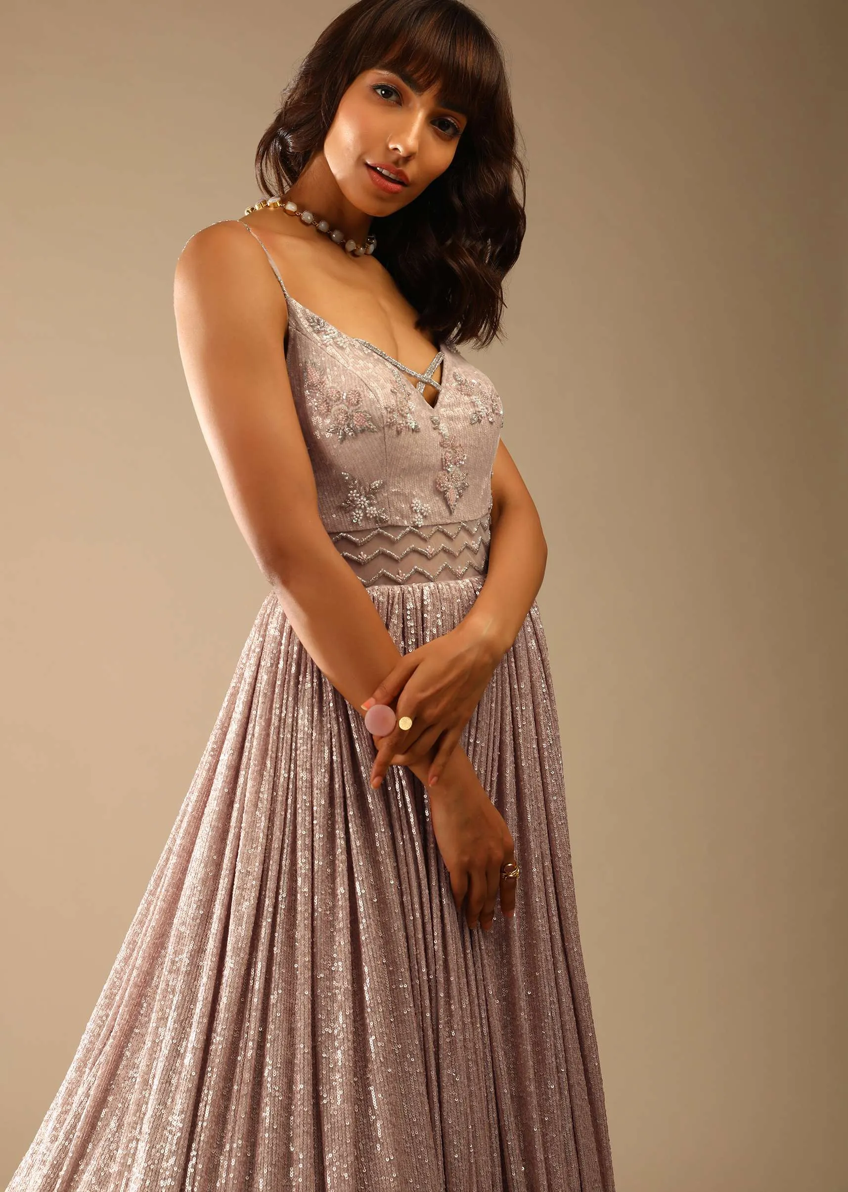 Champagne Gown Embellished In Sequins With Cut Dana Embellished Sheer Net On The Waist And Criss Cross Straps On The Neckline Online - Kalki Fashion